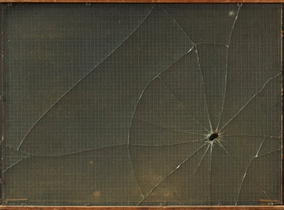 A bullet hole puncturing a clear glass window.