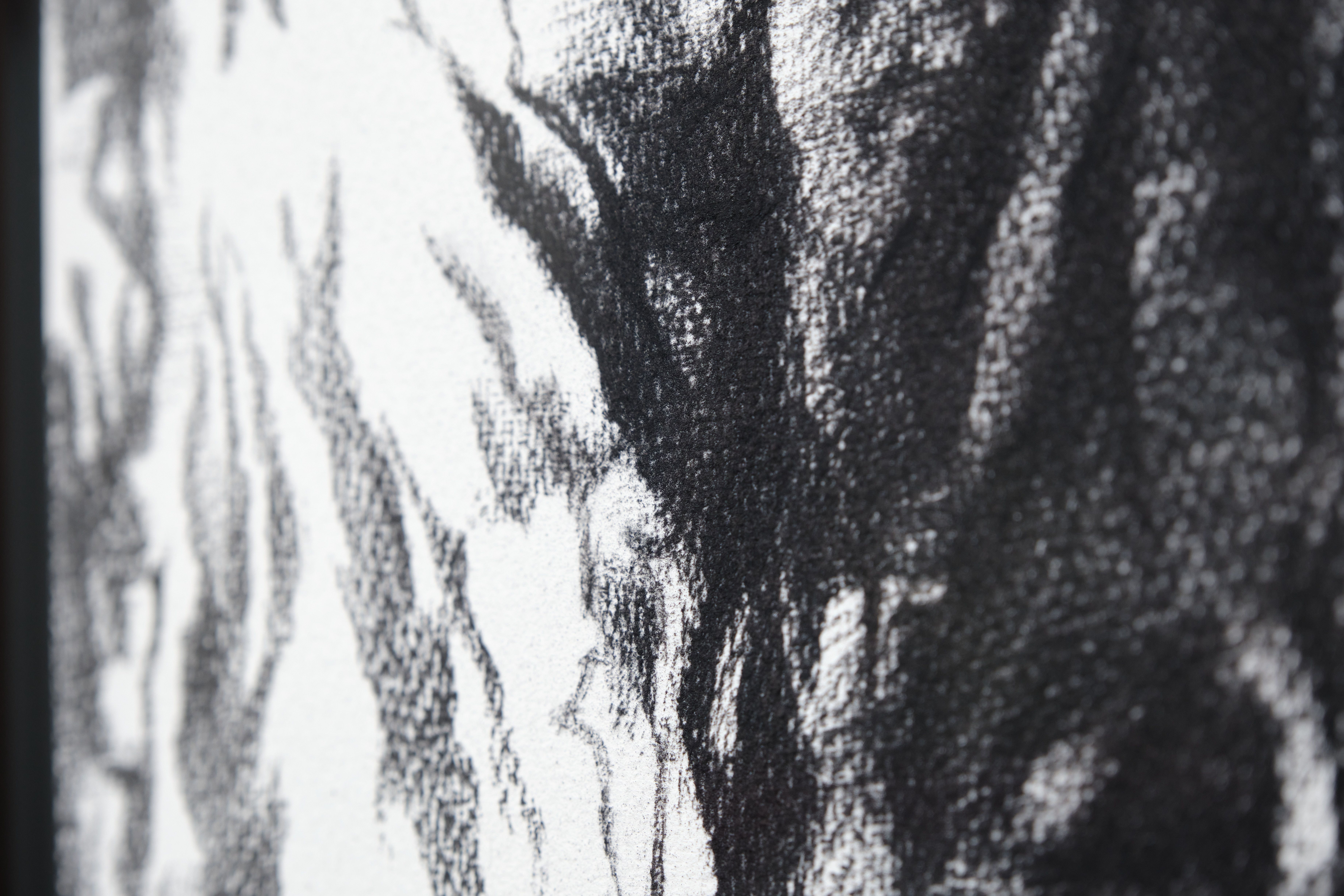 Detailed close-up of the textured black and white abstract drawing.