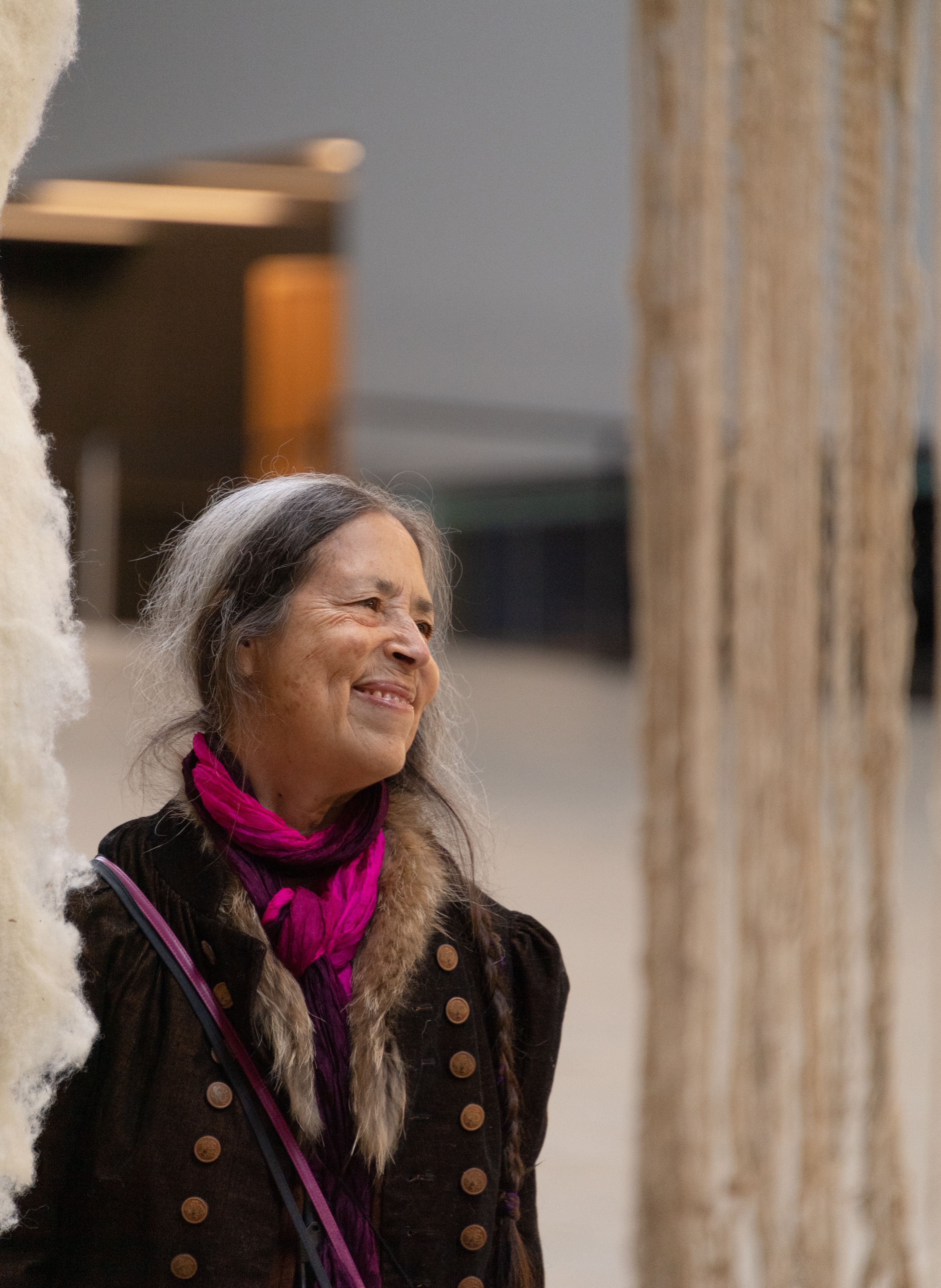 The artist looking into the distance at the Hyundai Commission installation at Tate Modern 2022.