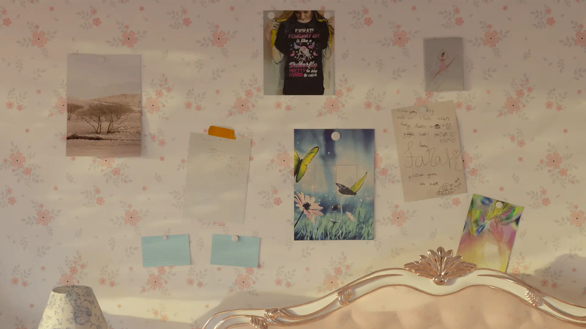 A bedroom wall decorated with pinned items: a landscape photo, a poster, and handwritten notes, against a floral wallpaper background.