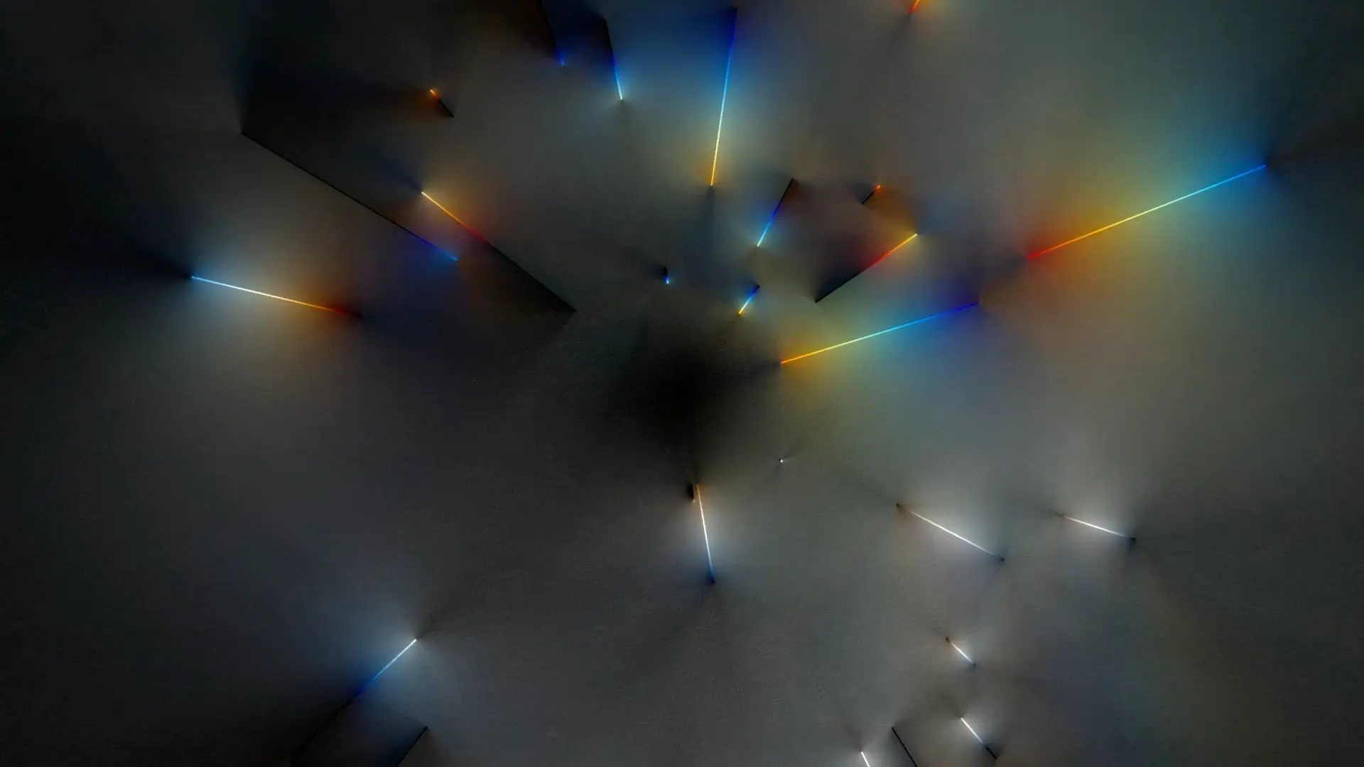 A visual study of light emitting outward energy by Zach Lieberman. The image is a blend of glowing lines in shades of blue...