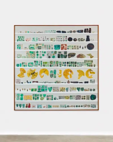 An exhibition at the Peabody Museum displaying a vast collection of 615 artefacts in shades of green and gold, carefully a...