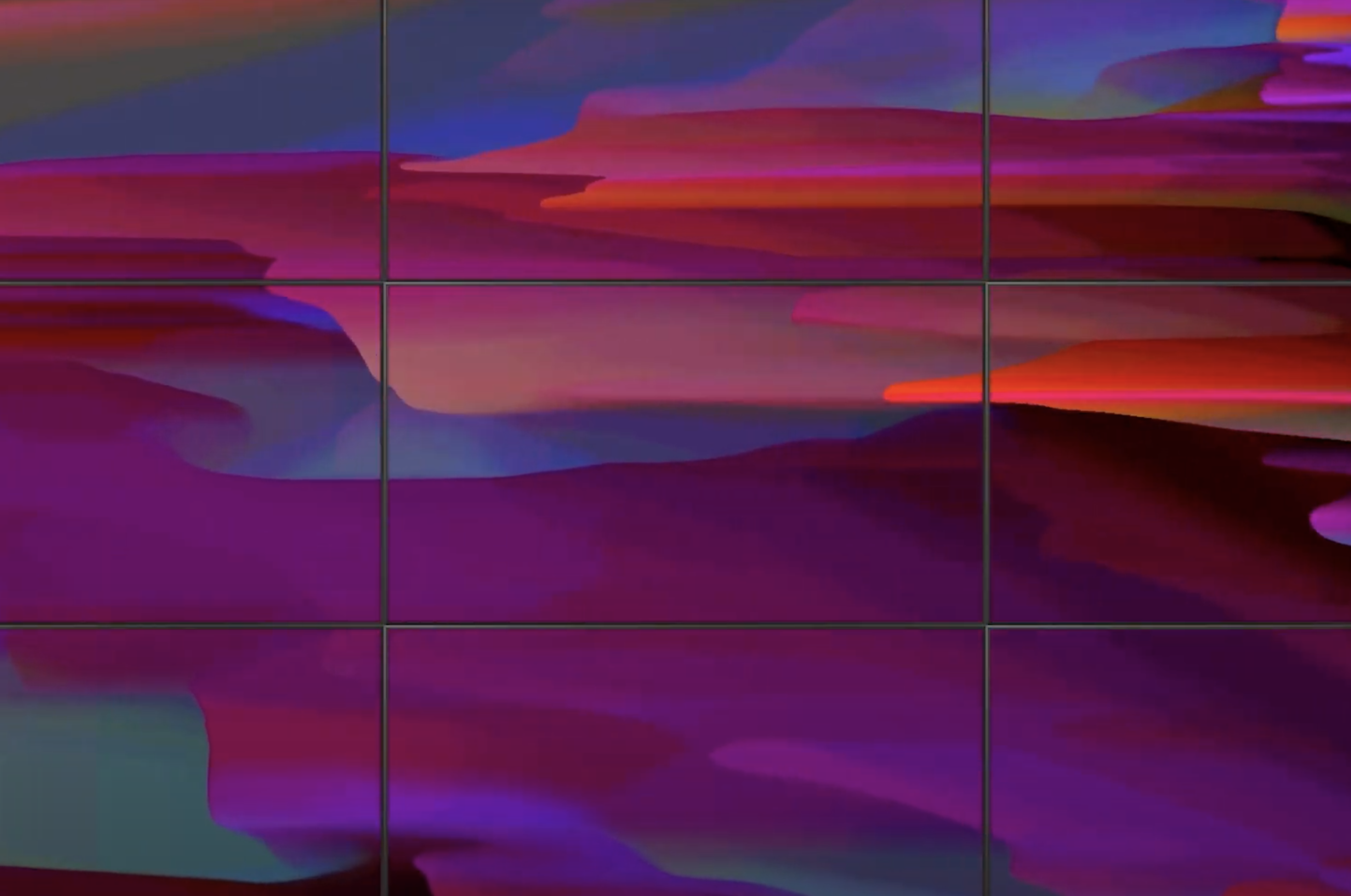 A large abstract artwork split into nine framed pieces, arranged in three rows, features a mix of pink, red, blue, and gre...