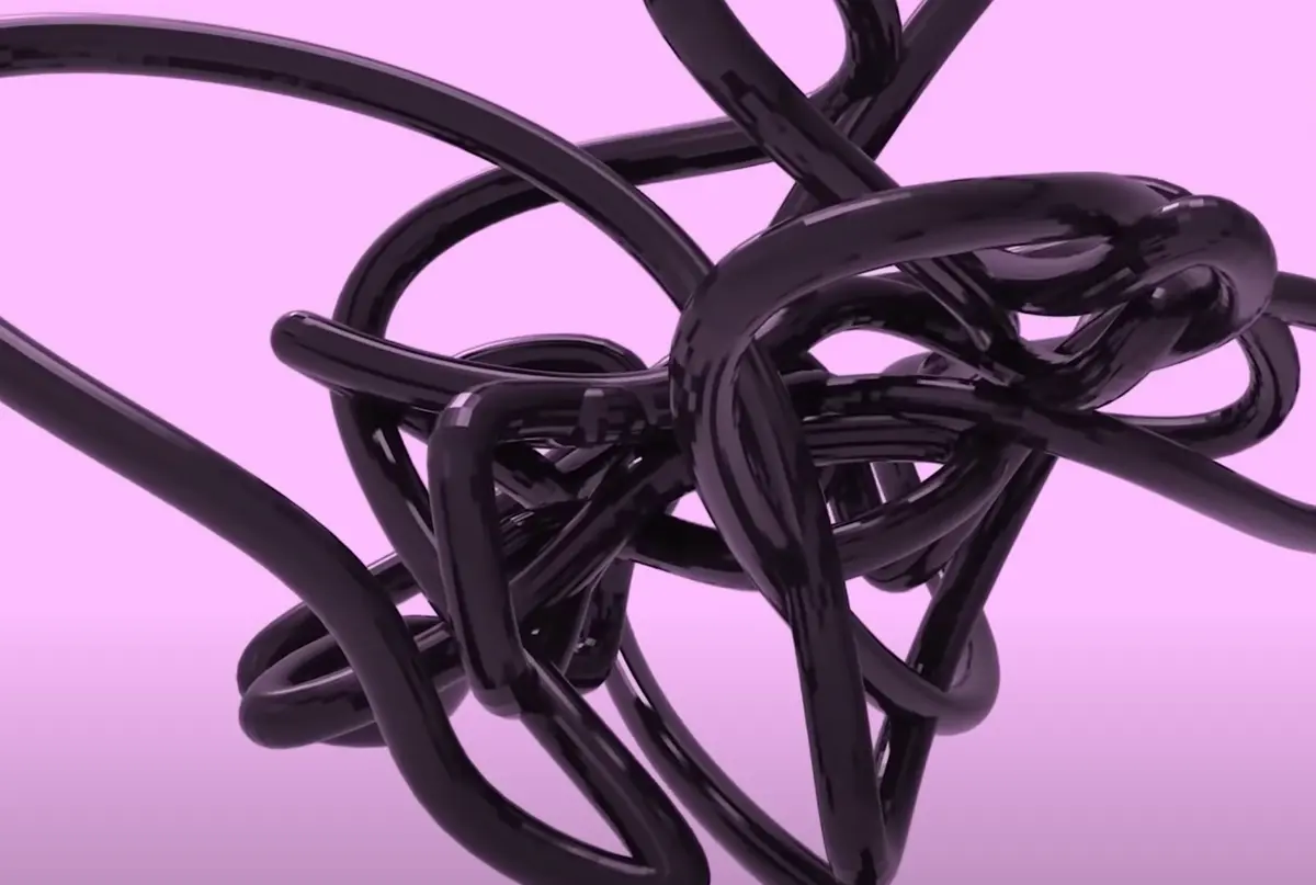 A glossy, black cable-like shape with multiple nodes stretches across a striking pink background.
