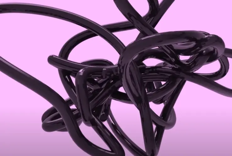 A glossy, black cable-like shape with multiple nodes stretches across a striking pink background.