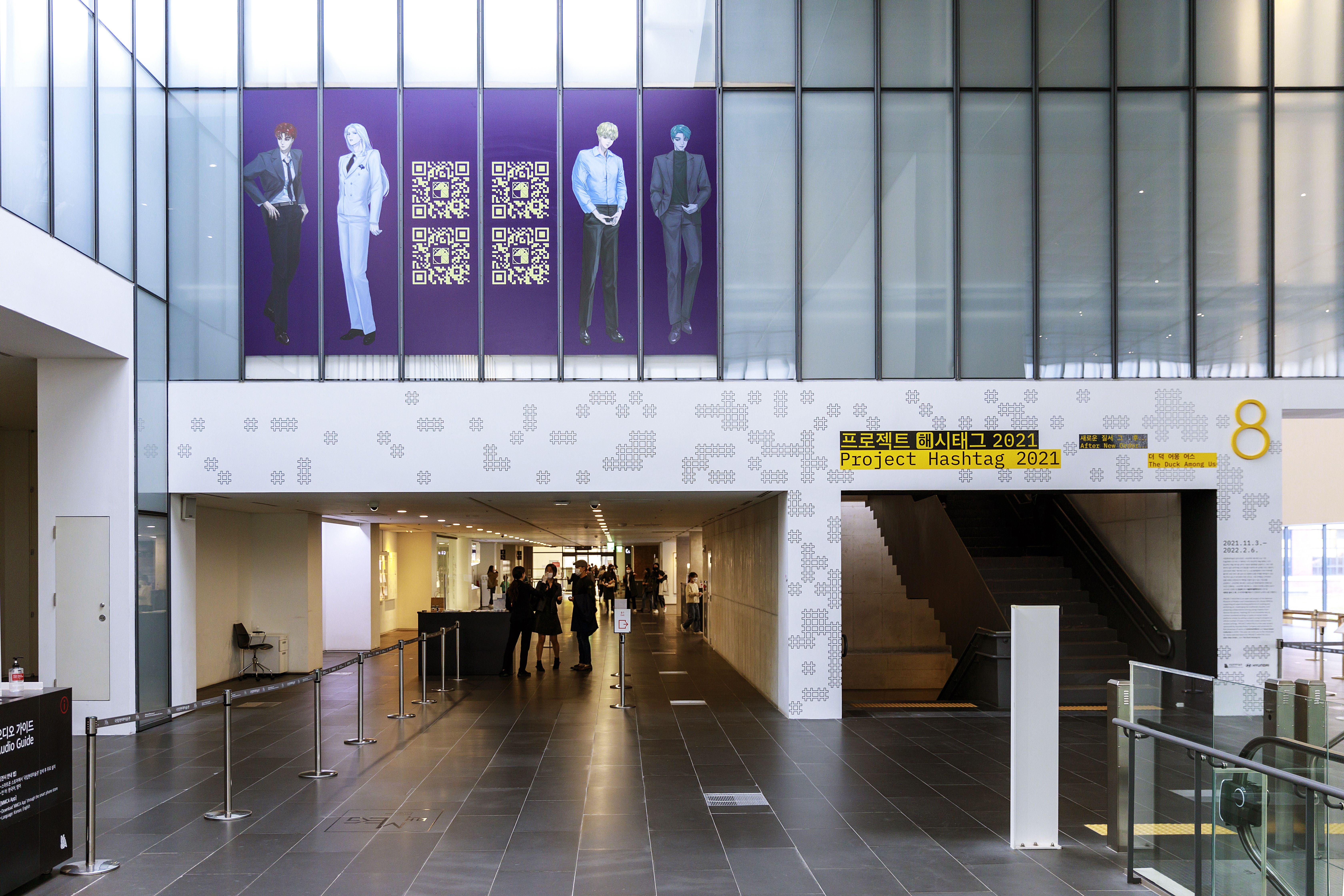 A metro station entrance adorned with the vibrant and captivating imagery promoting Project Hashtag 2021.