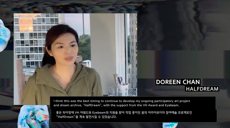 Doreen Chan, an artist, speaks to the camera with a caption displaying their thoughts about their ongoing participatory ar...