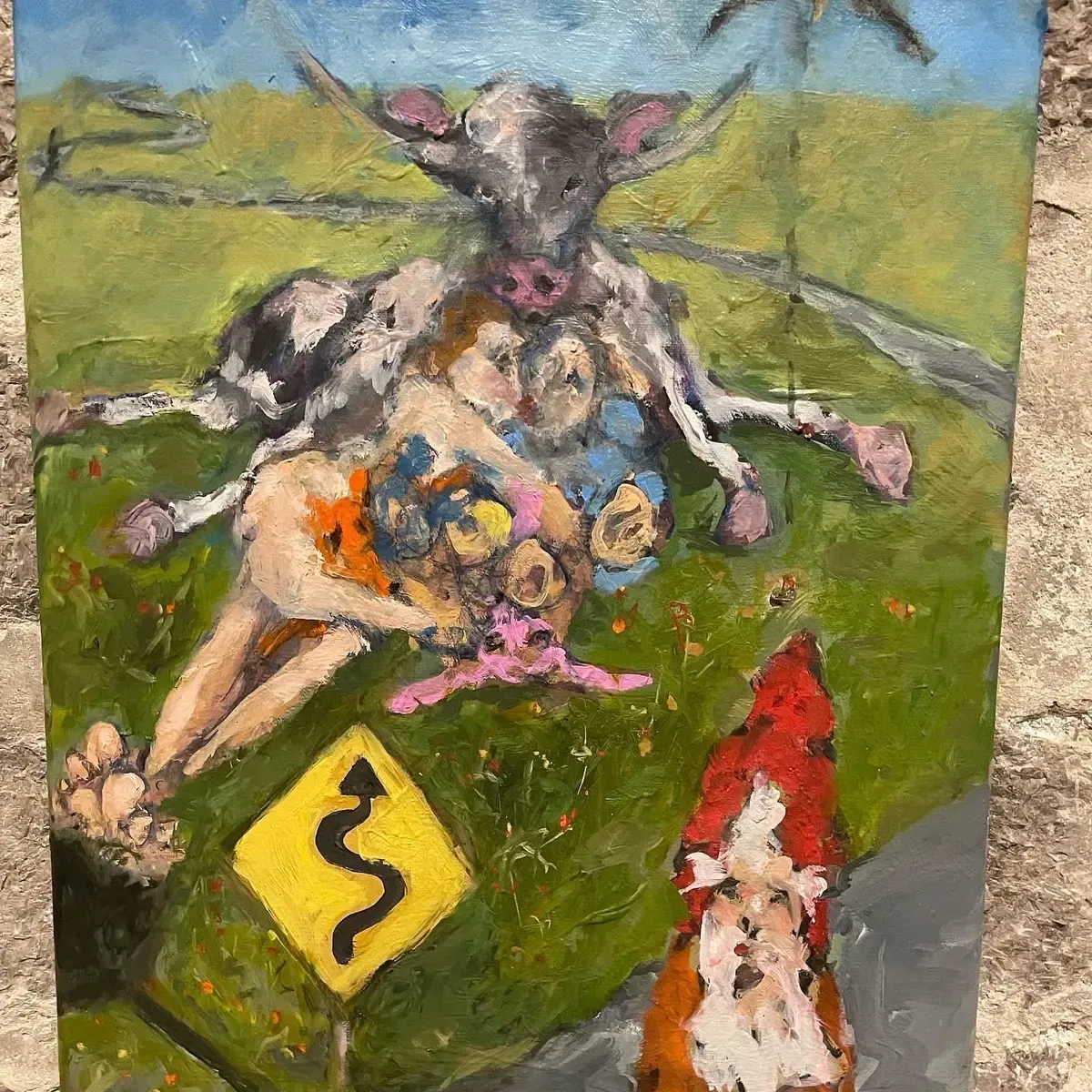 An image of a vibrant painting depicting a cow lying on grass, a couple kissing, a winding road, and a gnome in a red hat.