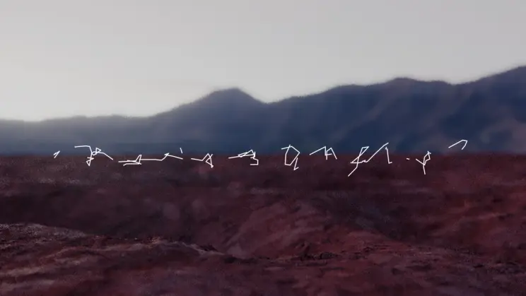 More fluid white abstract lines hovering over the same desert landscape.