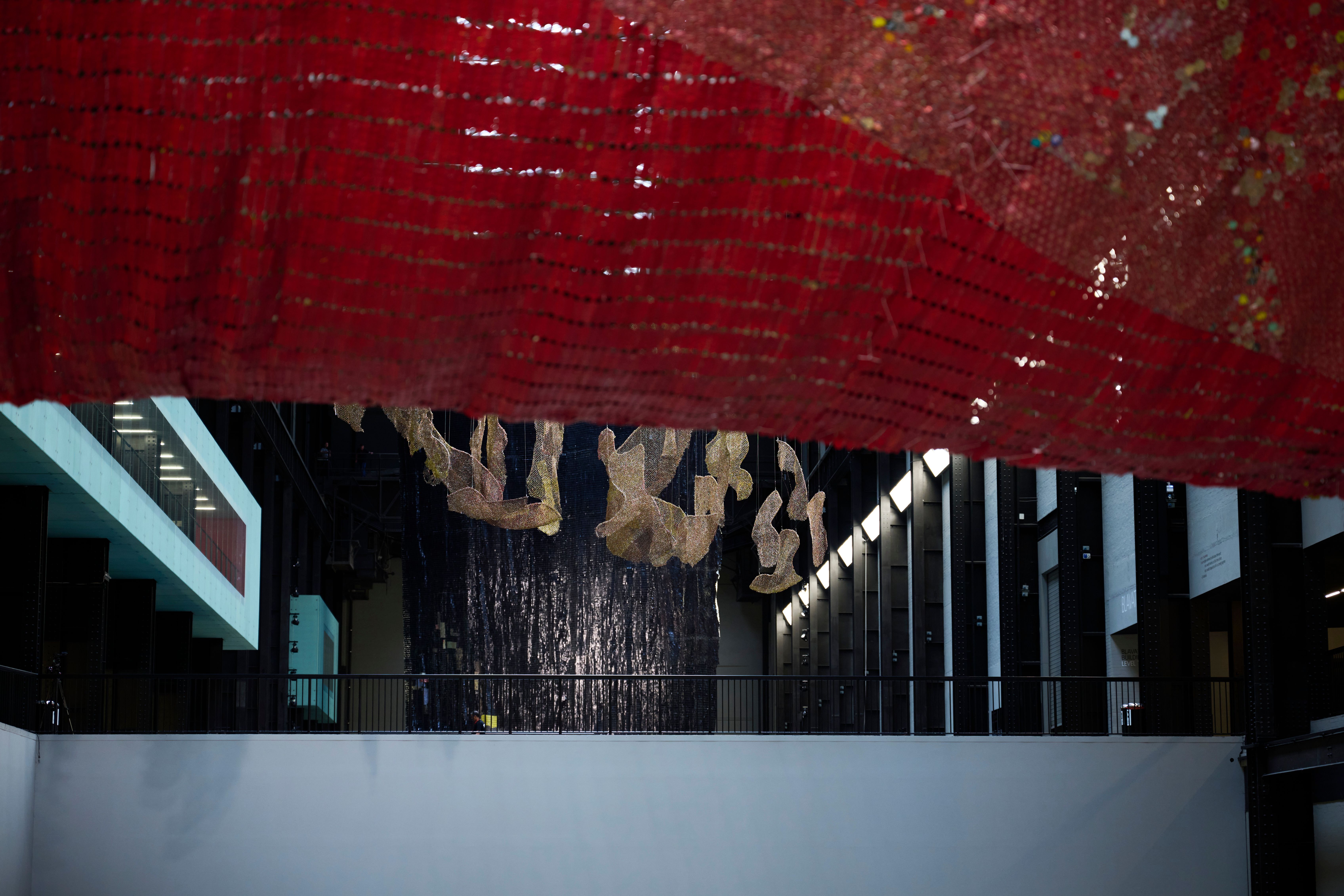 An installation view of hanging sculptures at Tate Modern's Turbine Hall.