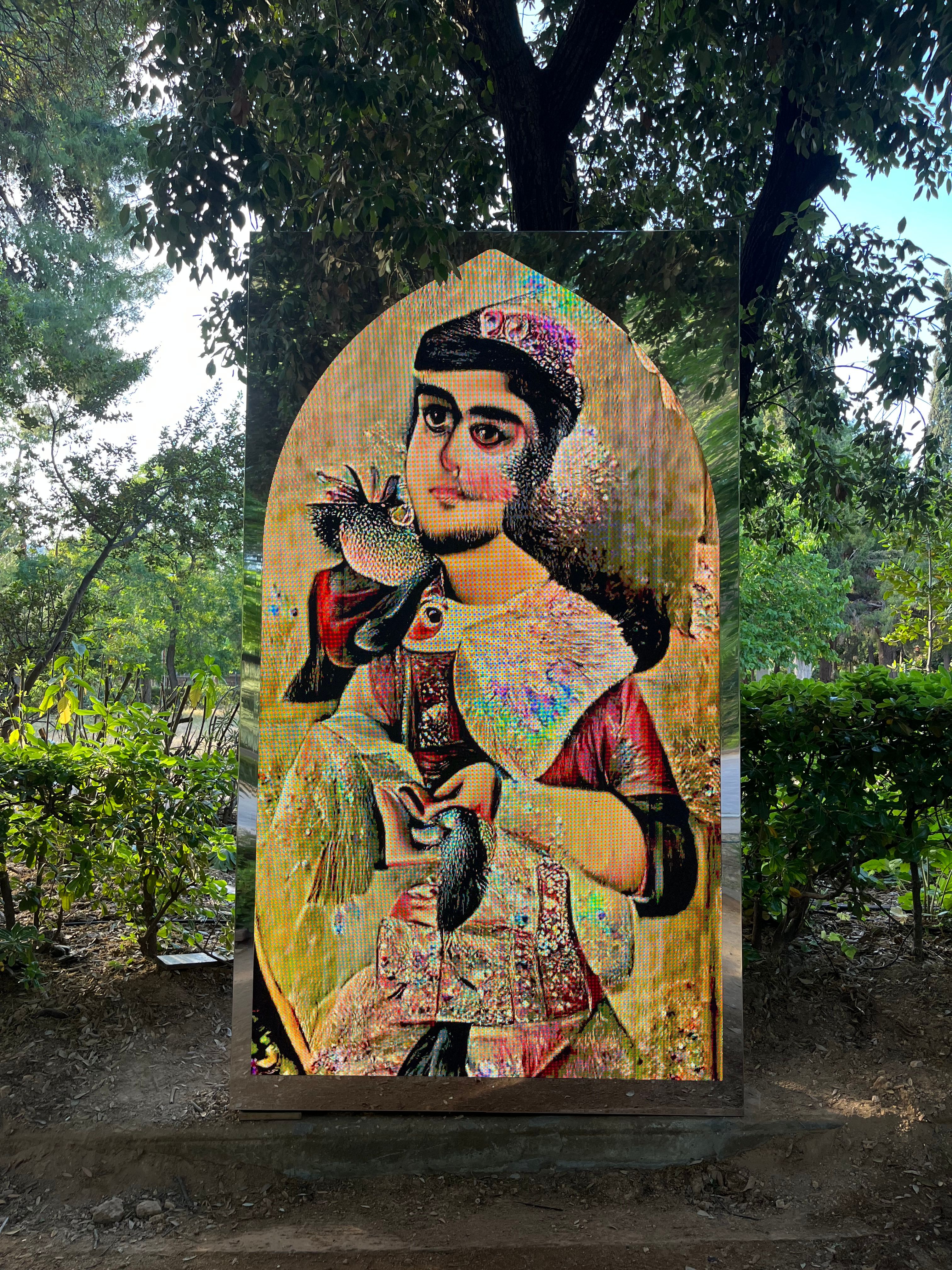 A digital artwork in a park depicting a stylized portrait of a historical figure with vibrant colors and intricate details.