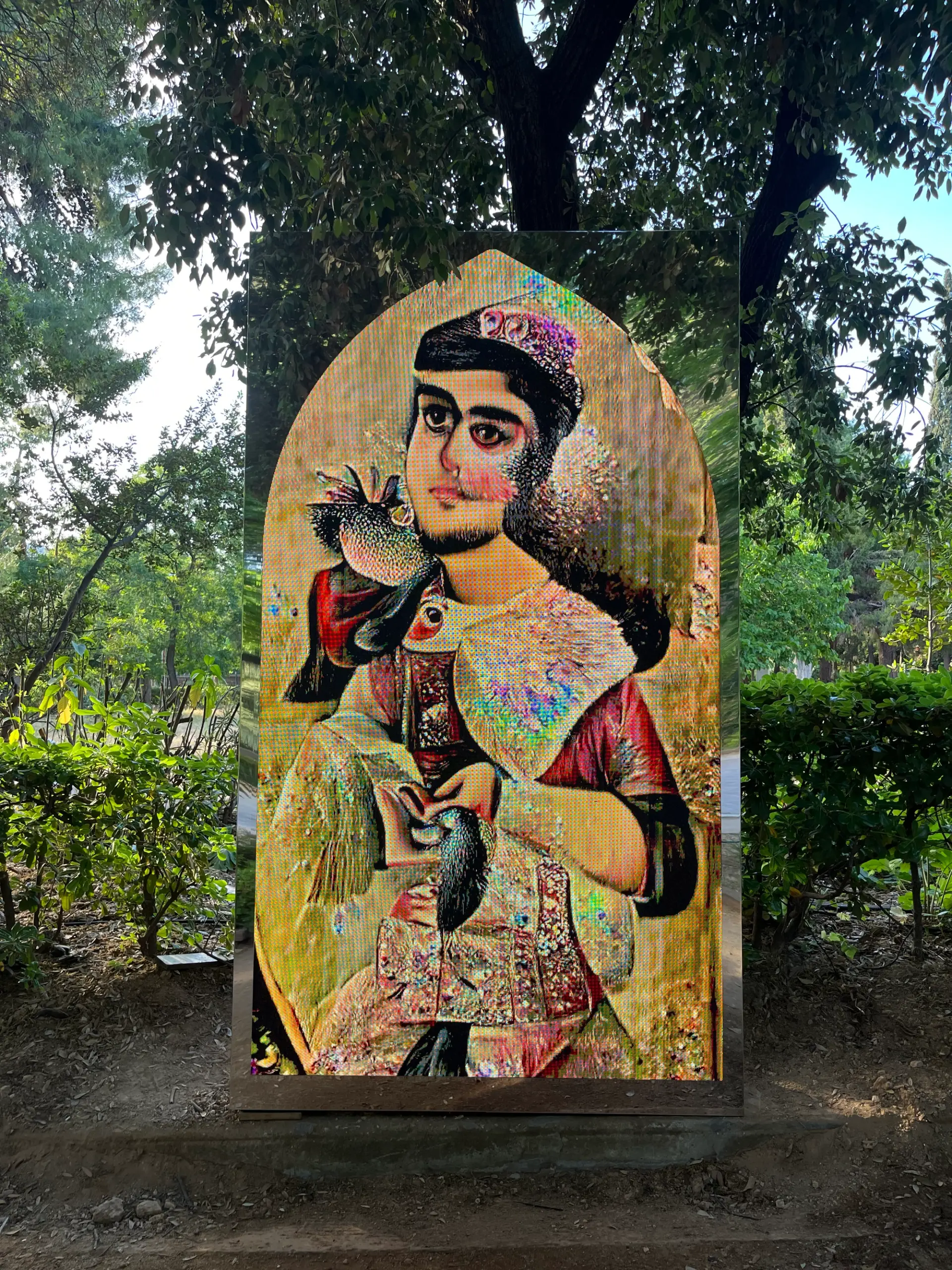 A digital artwork in a park depicting a stylized portrait of a historical figure with vibrant colors and intricate details.