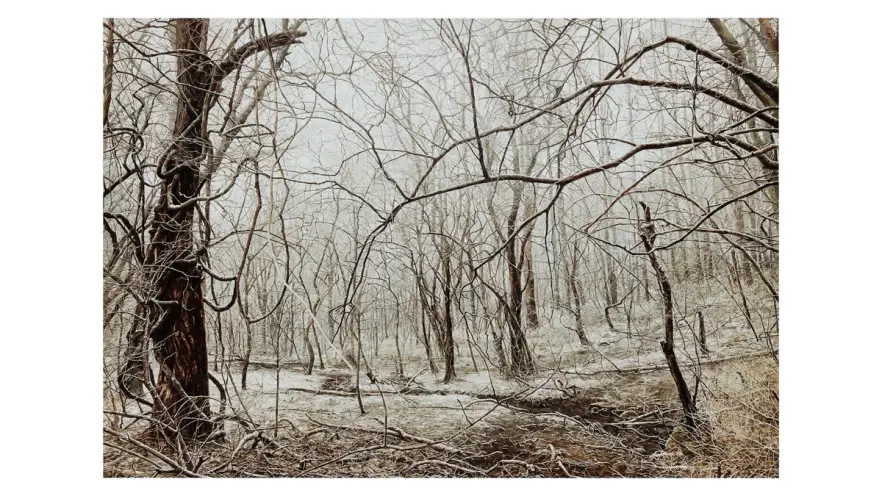 A large oil painting of a winter landscape depicting leafless trees against a muted background.