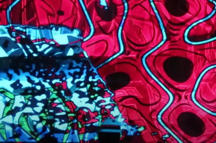 Abstract artwork featuring intertwined curved forms in bold hues of red, black, and aqua blue.