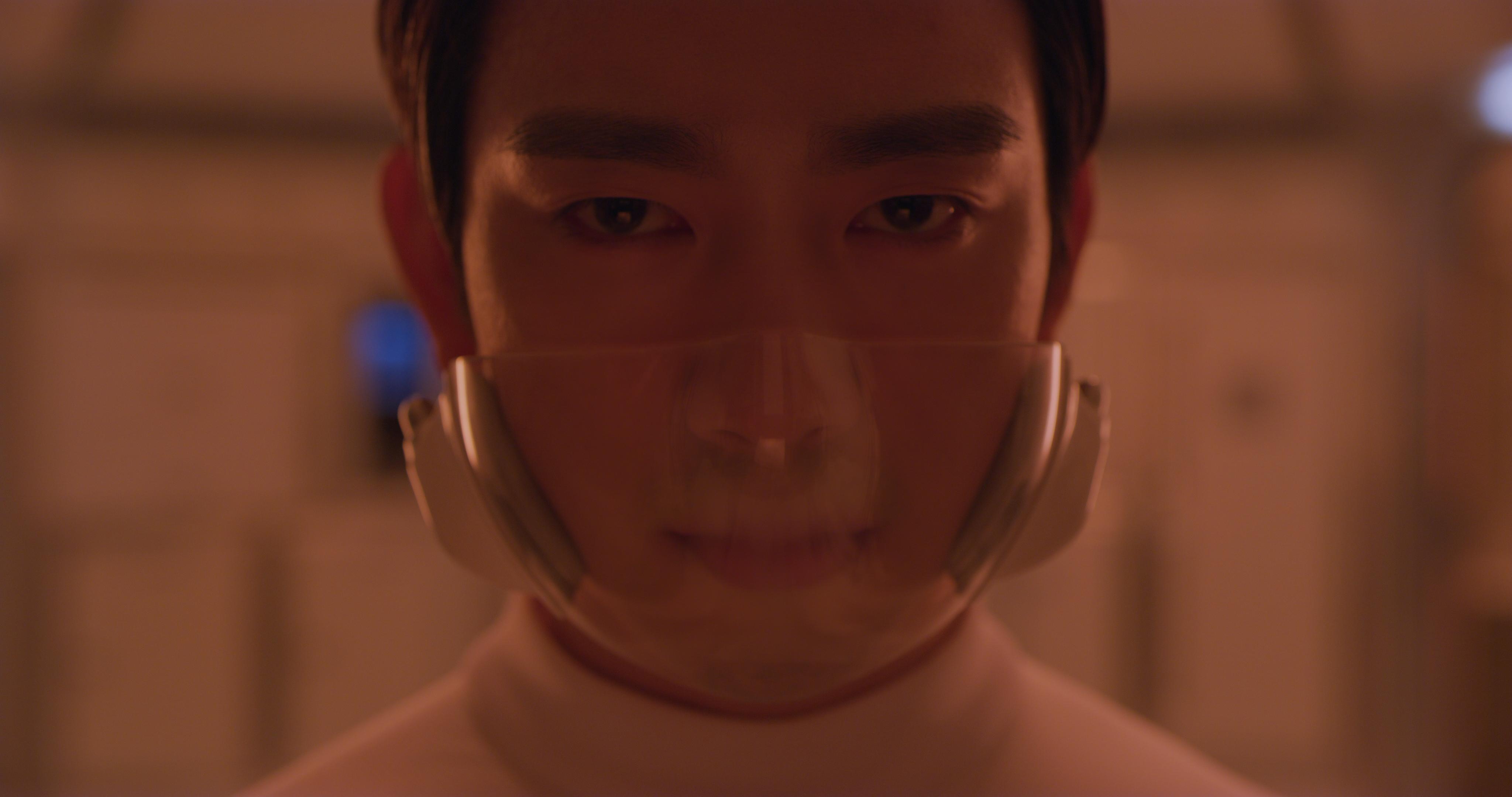 A still from Moon Kyungwon & Jeon Joonho's 2 channel HD film installation "NEWS FROM NOWHERE: FREEDOM VILLAGE," depicting ...