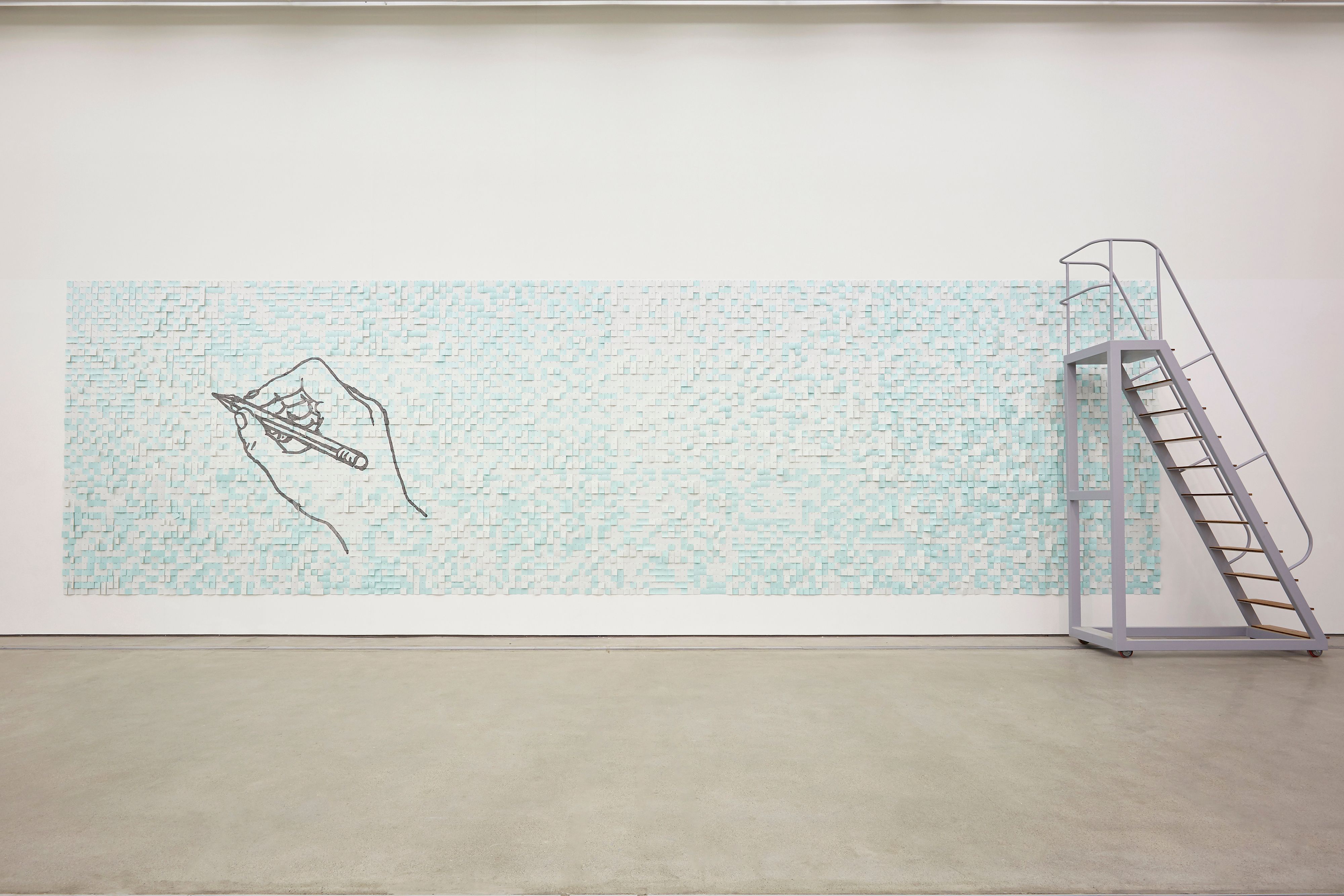 A wide rectangular mosaic art piece in aqua blue, featuring a drawn hand holding a pencil on the left. A silver metal ladd...
