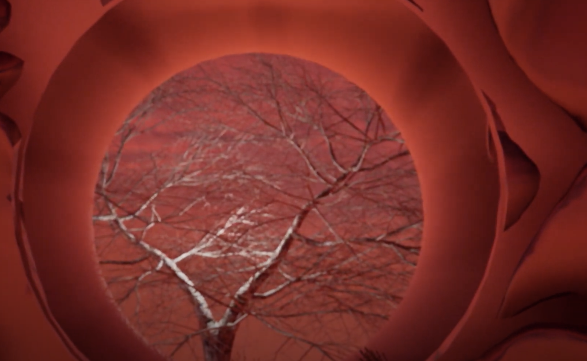 An illuminated tree can be seen through a circular opening in a bold, red architectural structure. The vibrant red sky in ...