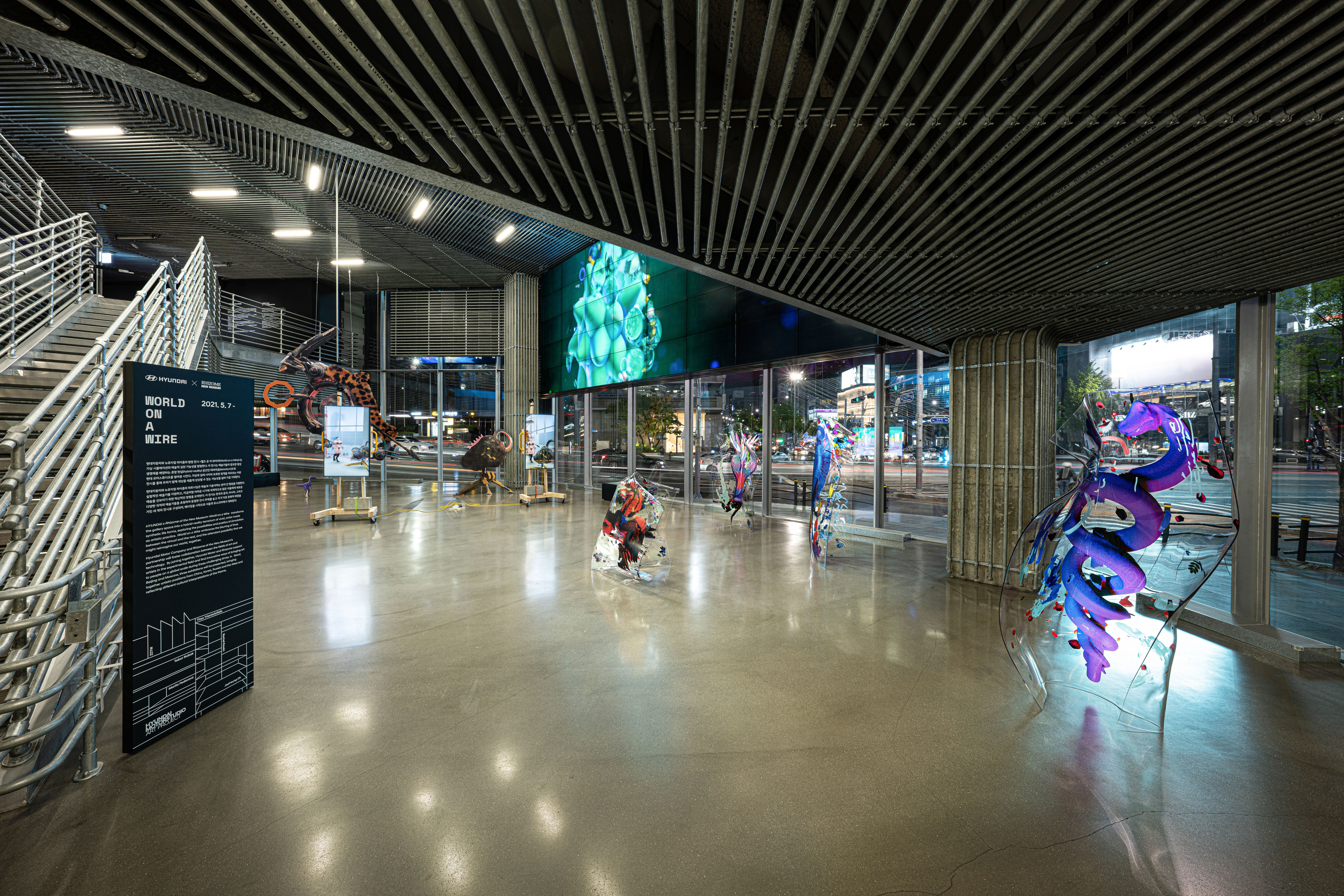 A gallery hall in Seoul featuring various art installations.