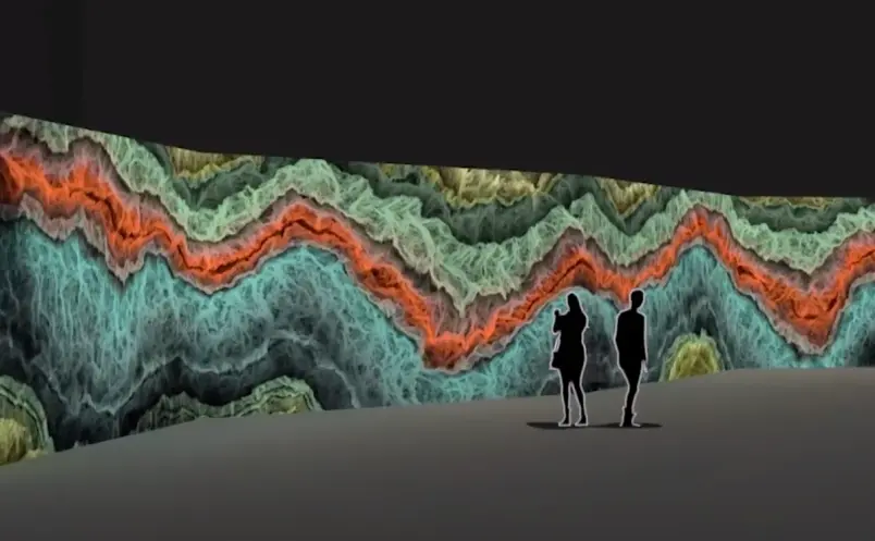 An expansive art graphic depicting waves in shades of green, aqua blue, and orange stretches along a wall. The grey floor ...