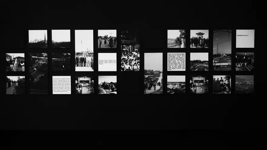 An extensive display of various pictures and textual documents arranged in a grid formation on a stark black background.
