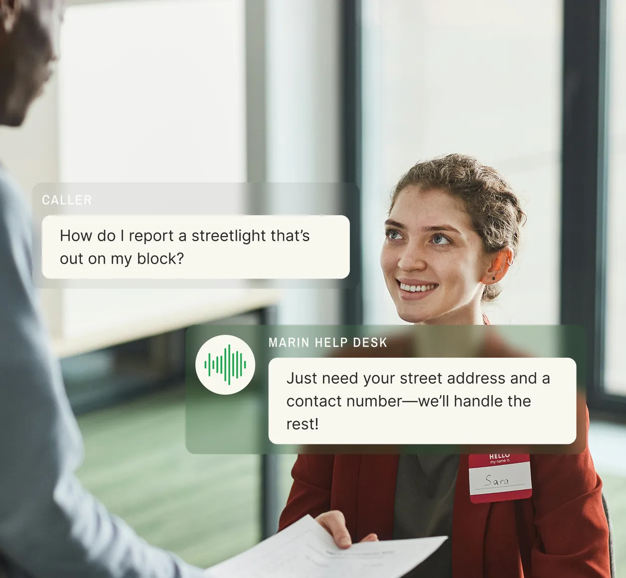 At a service desk, a caller reports a streetlight outage, and the city answering service requests the street address and a contact number.