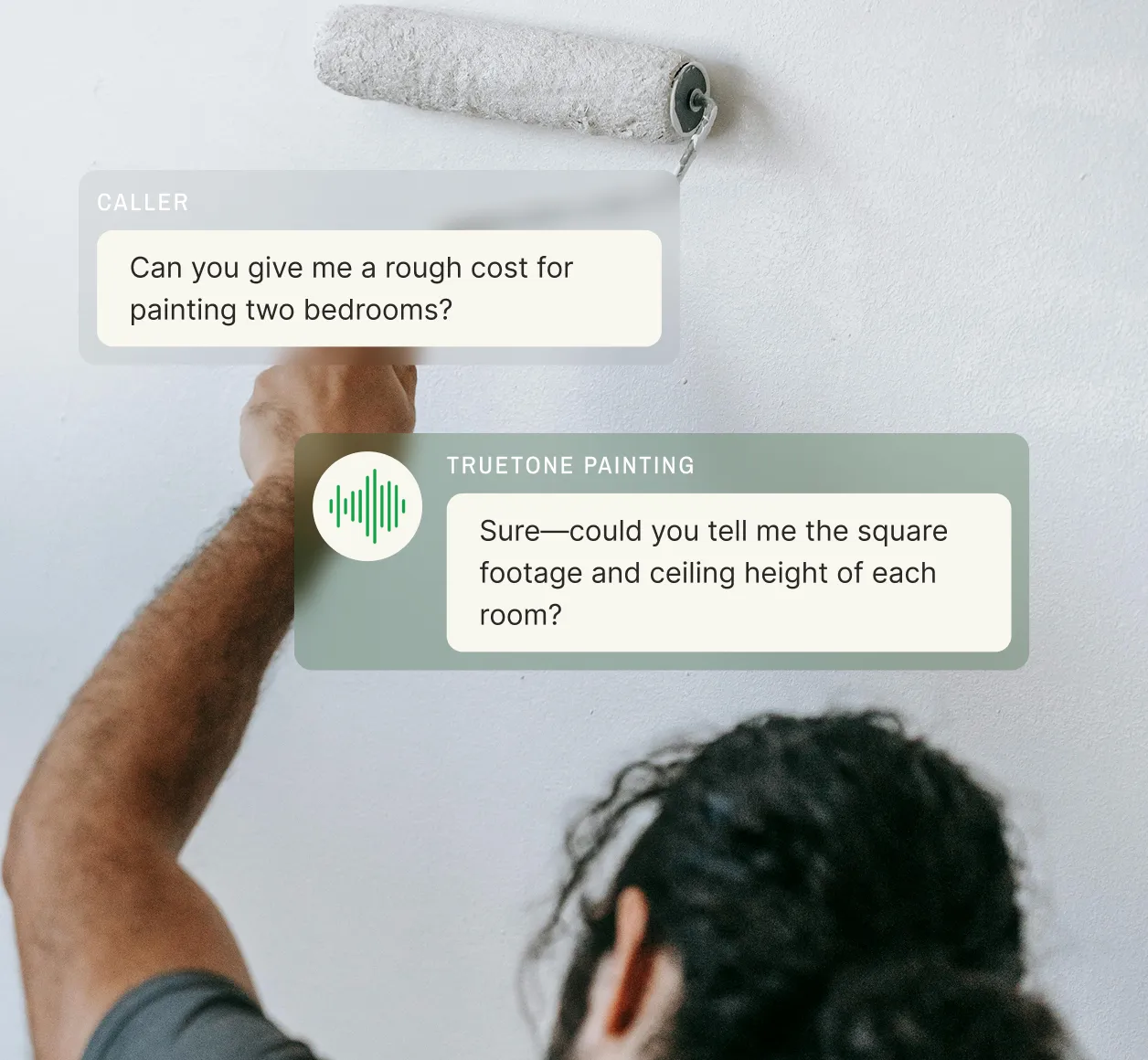 A painter rolls white paint on a wall while a painter answering service asks for square footage and ceiling height after a caller requests a cost for painting two bedrooms.