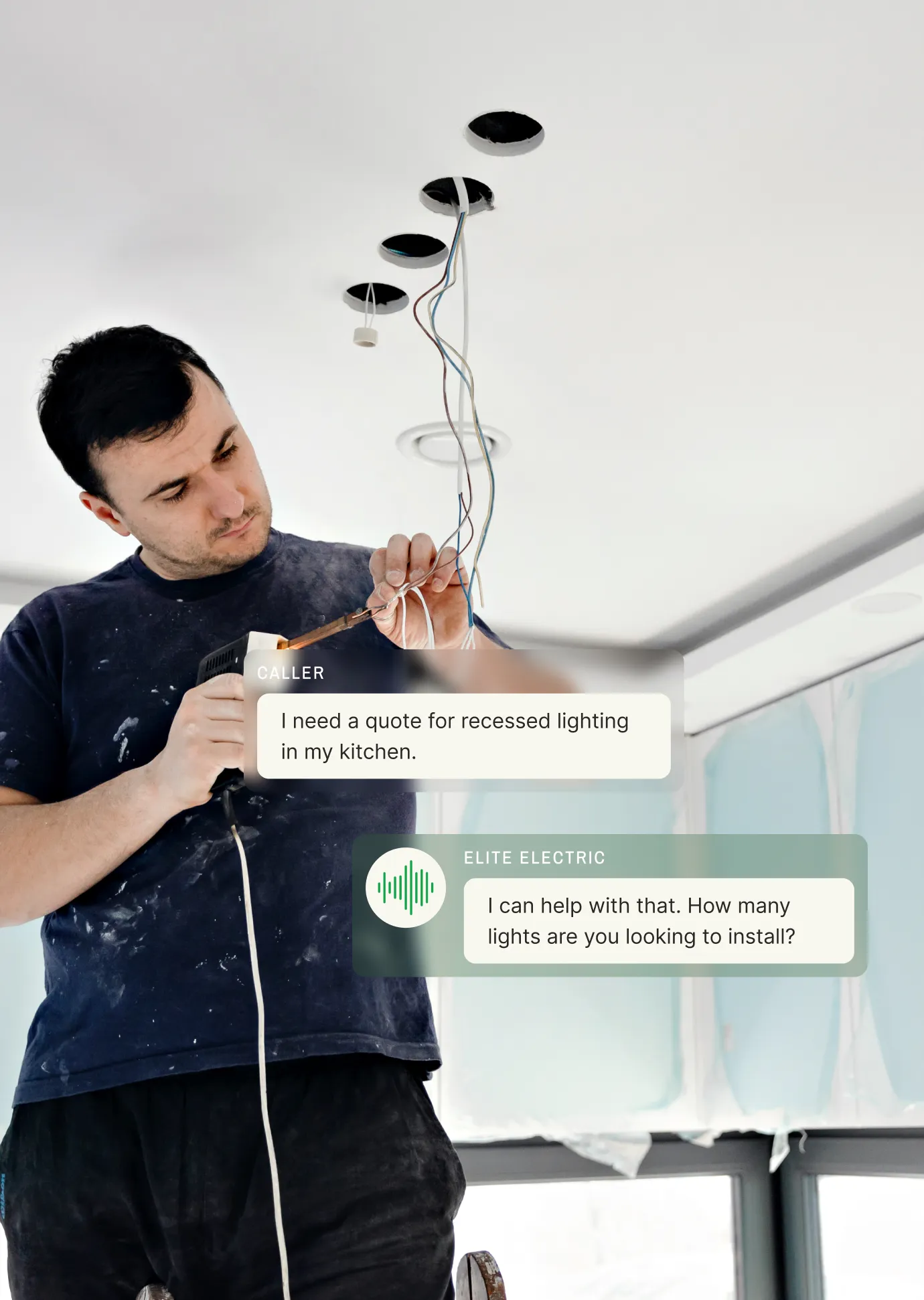 Electrician answering service handling kitchen recessed lighting quote requests while electrician works