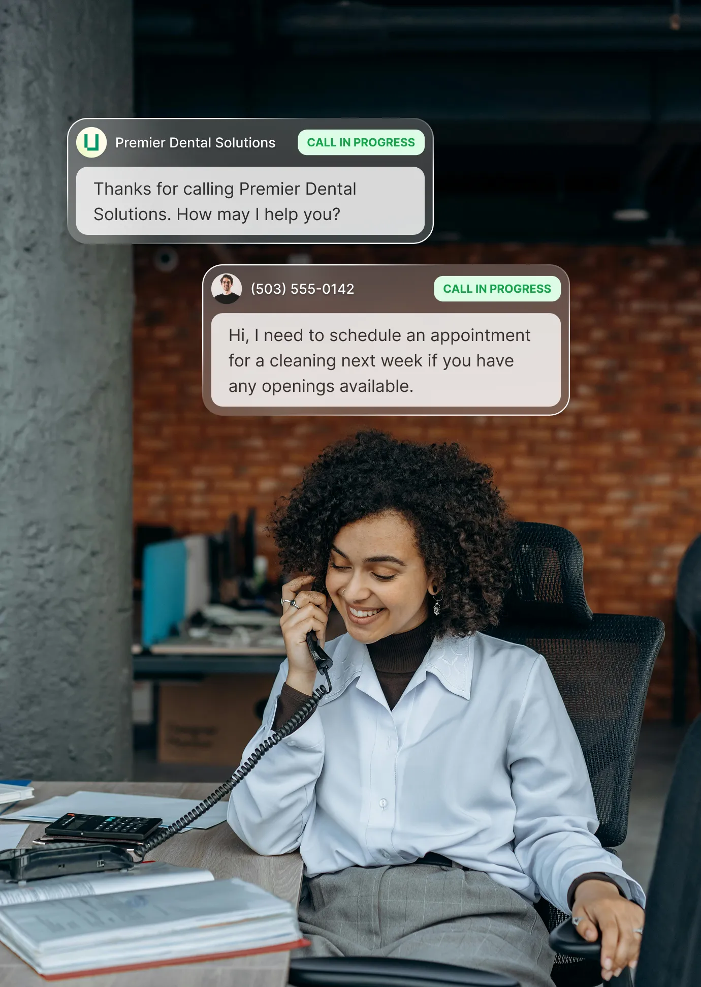 An AI receptionist answering a call for a small business while the owner works.