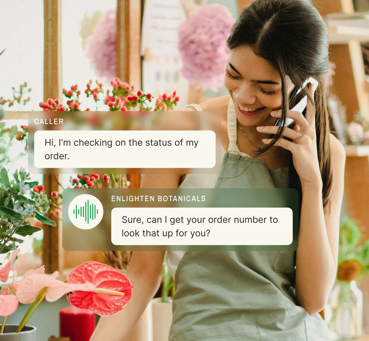 A cheerful florist using an electronic receptionist system to check the order status for a customer while taking a phone call