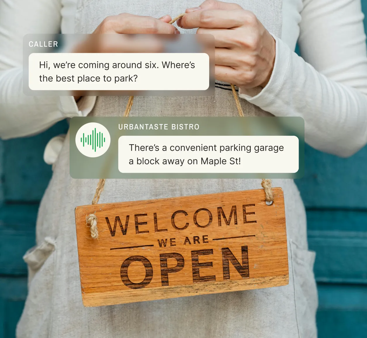 A bistro employee holds a “Welcome, We Are Open” sign, illustrating how voicemail services enhance customer interactions for small businesses.