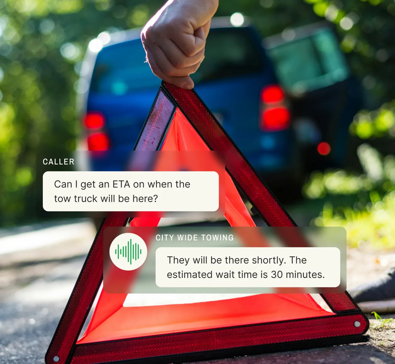 Emergency warning triangle with towing company answering service providing 30-minute ETA update