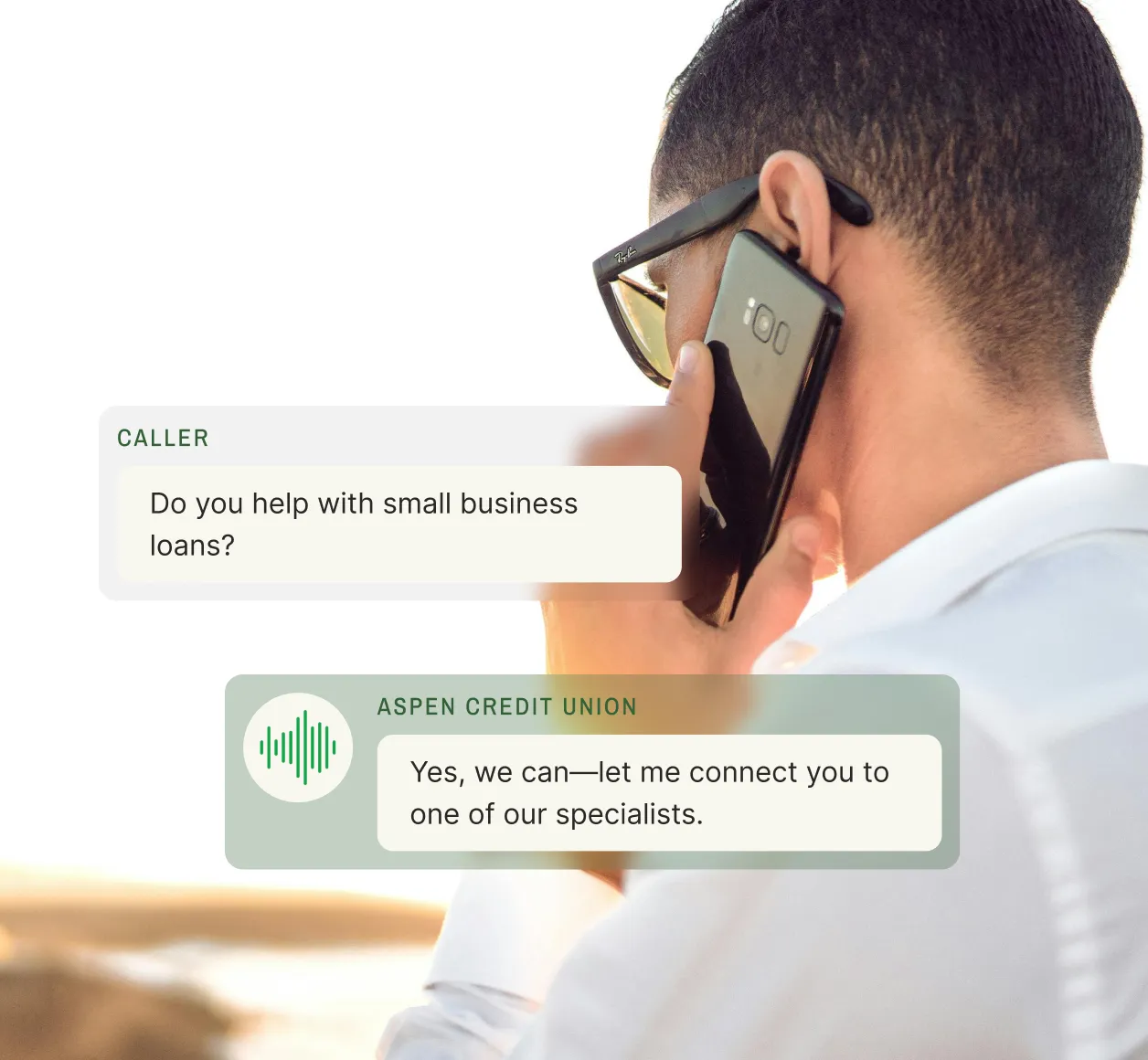 A man using an electronic receptionist service on his smartphone to inquire about small business loans with ease.