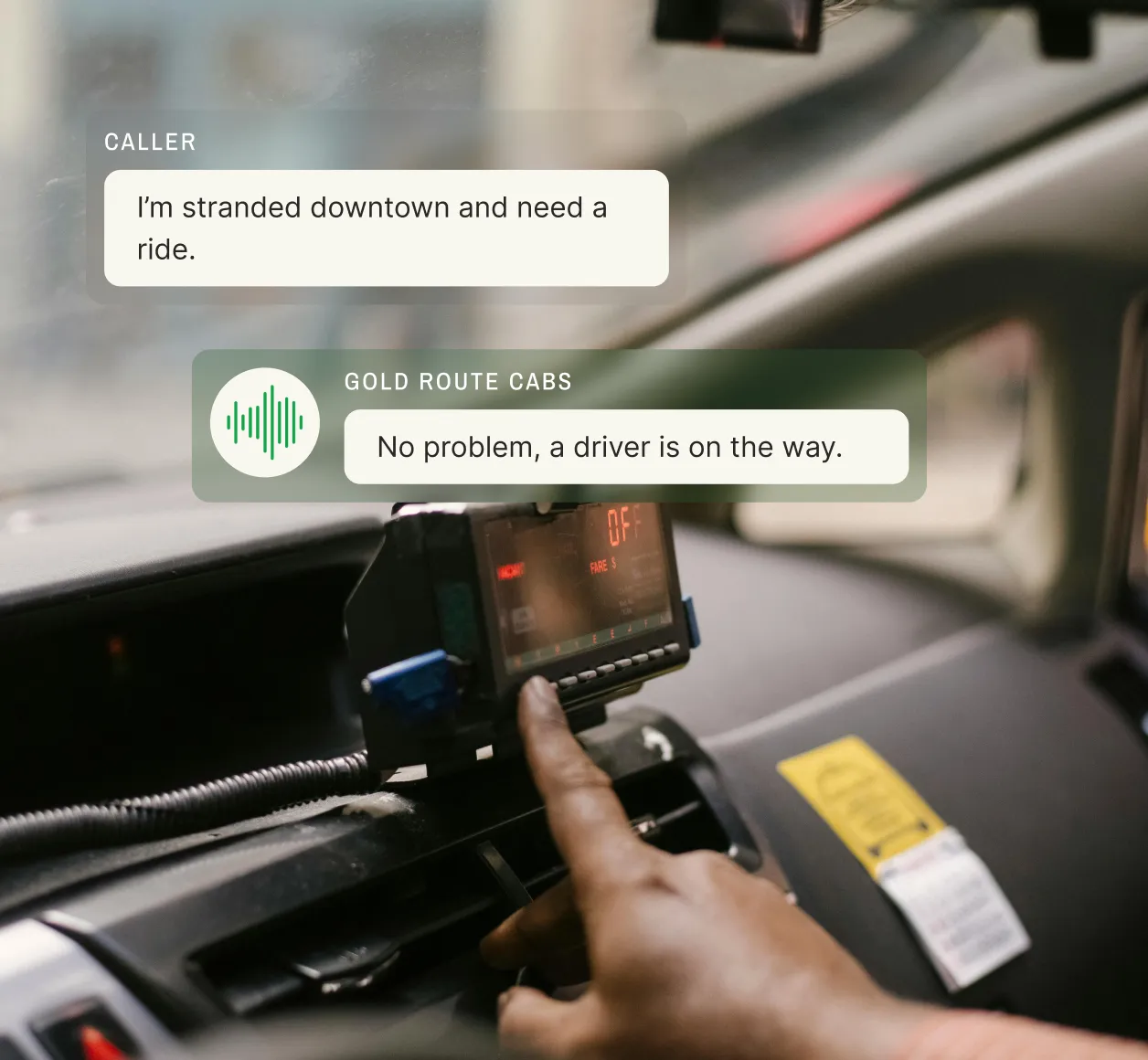 A taxi meter with a driver en route to pick up a stranded customer downtown.