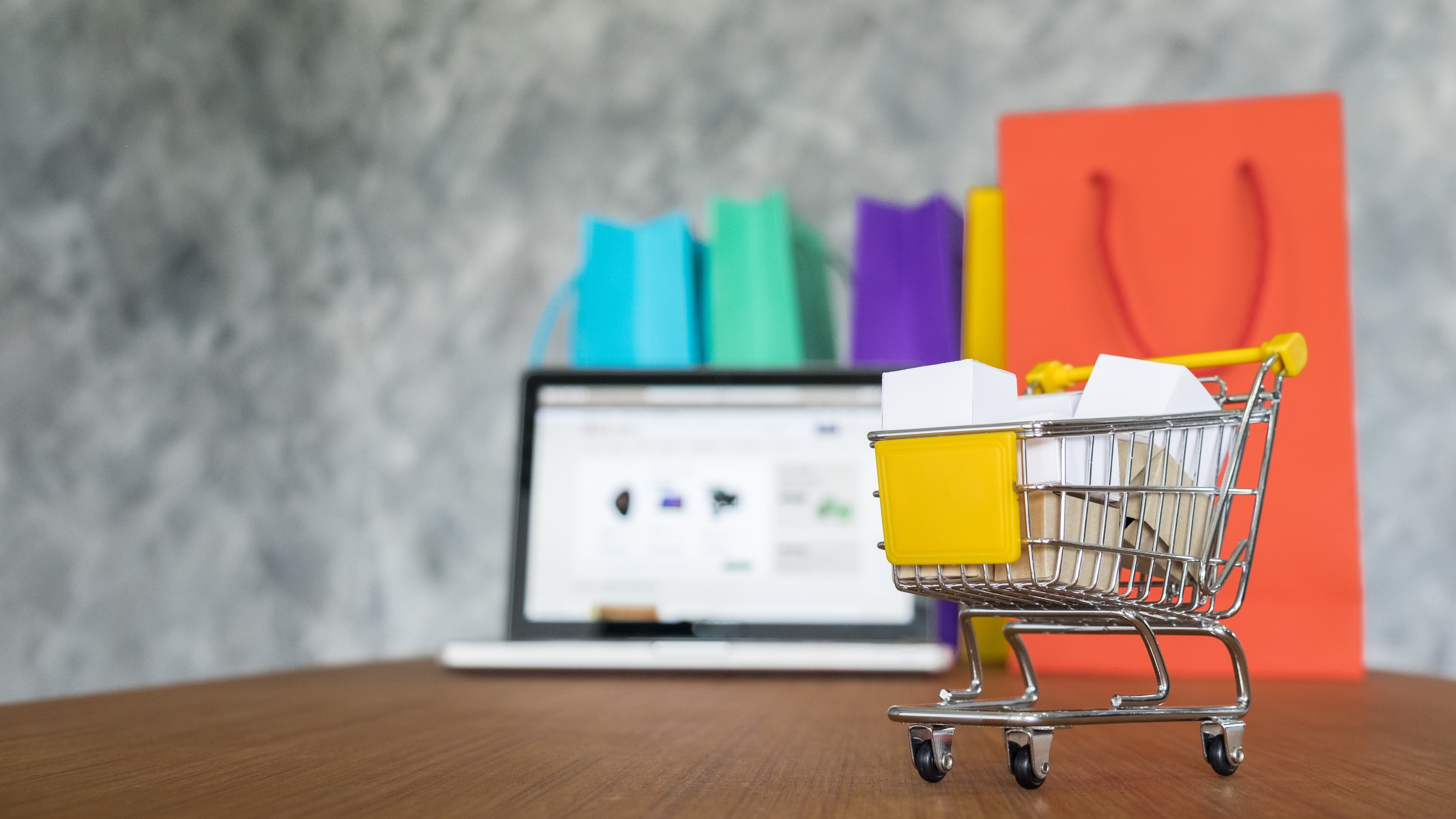 laptop-shopping-bags-online-shopping-concept.jpg