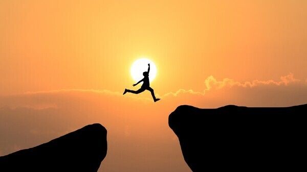 courage-man-jump-through-the-gap.jpg