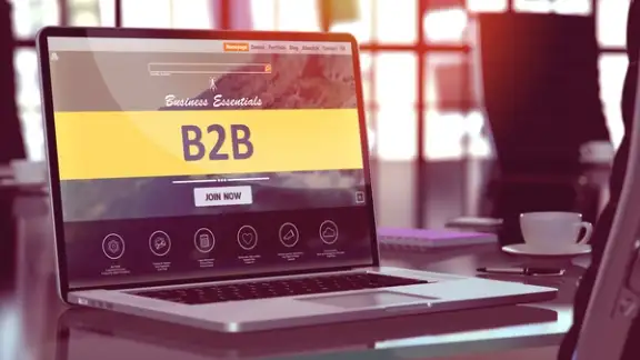 B2B - Business to Business - Concept - Closeup on Laptop Screen in Modern Office Workplace. Toned Image with Selective Focus. 3d Render.-1.jpeg
