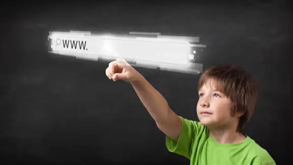 Little boy touching web browser address bar with www sign.jpeg