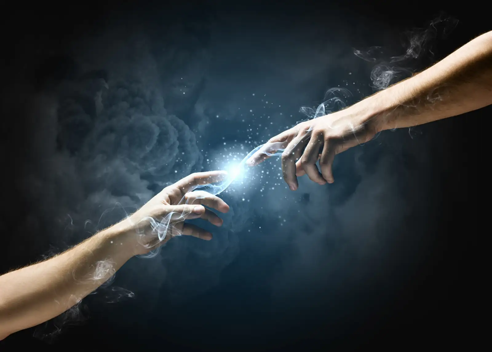 Michelangelo Gods touch. Close up of human hands touching with fingers.jpeg