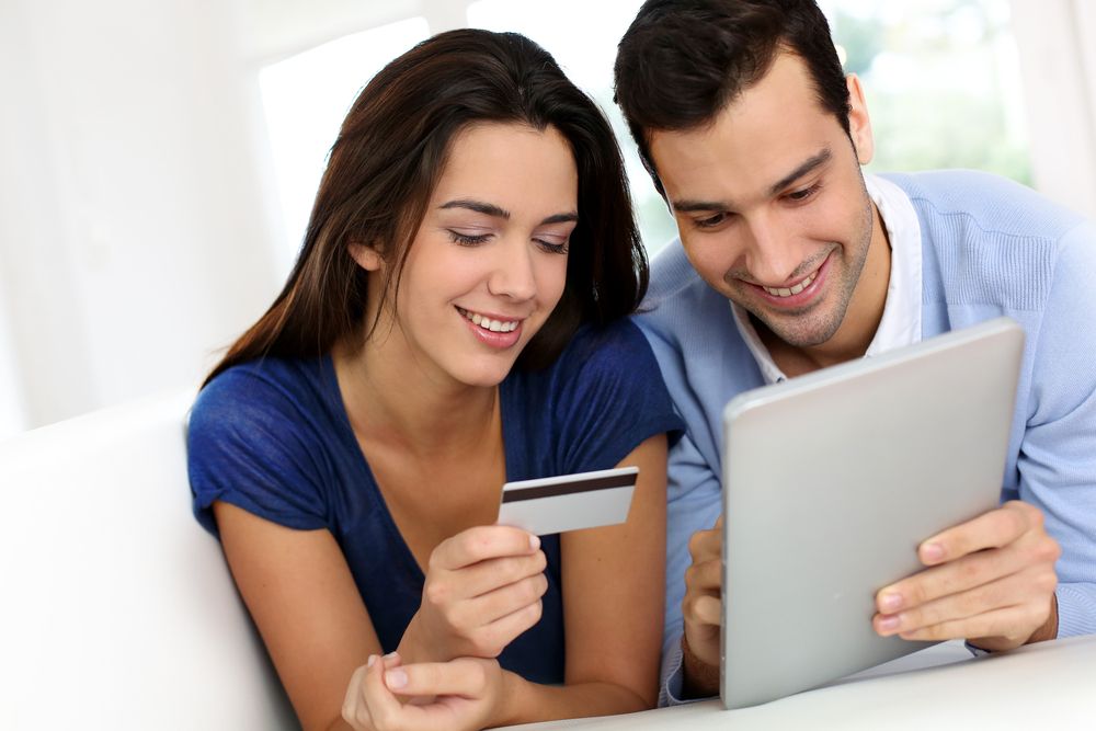 Young couple shopping online from home.jpeg