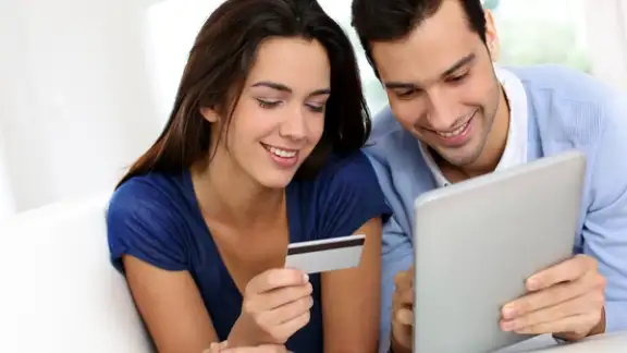 Young couple shopping online from home.jpeg