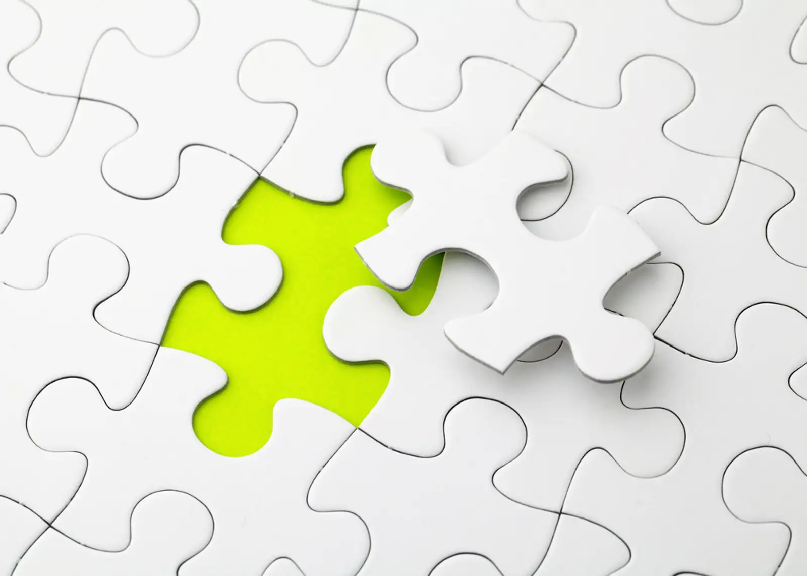 Puzzle with missing piece in green color.jpeg