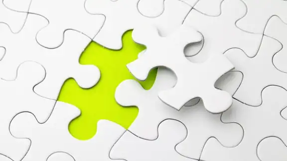 Puzzle with missing piece in green color.jpeg