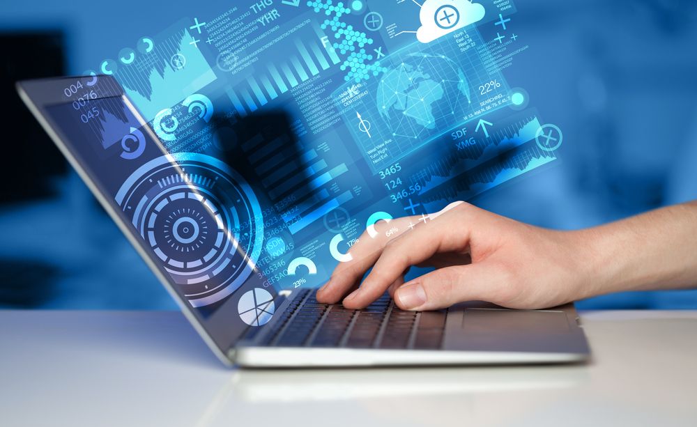 Modern notebook computer with future technology media symbols-1.jpeg