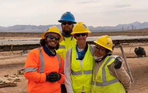 Photo of solar workers building a project