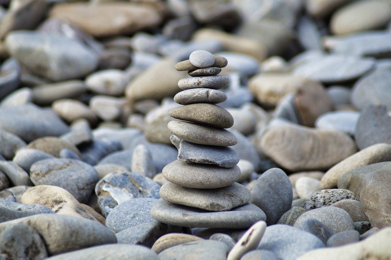 Pebbles balancing on a beach