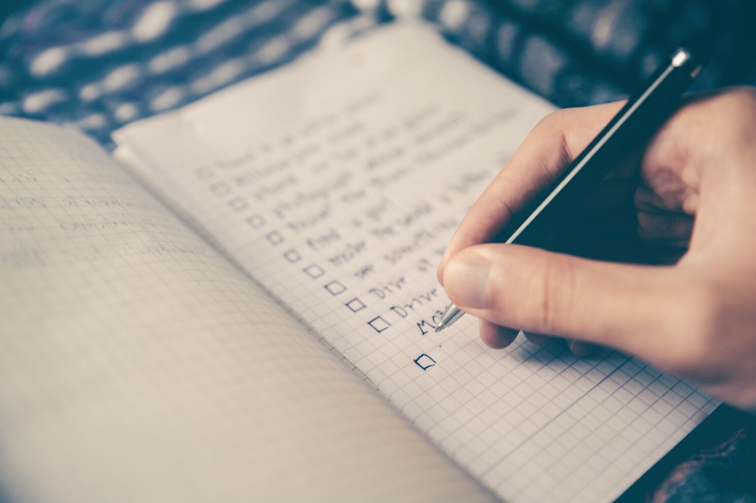Taking notes and planning time and tasks. A to-do list.