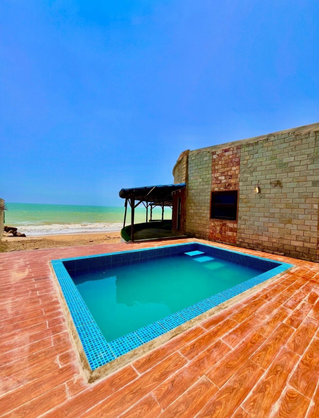 The Green Emerald Beach Hut A-10  gallery photo 6