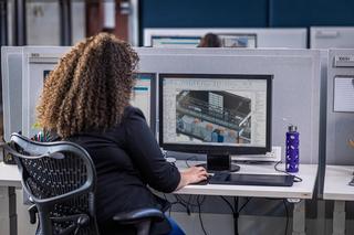 person at computer using revit BIM software