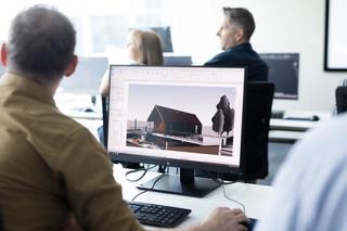 Architectural rendering on a computer screen being used by a student in a Cadpro training class room