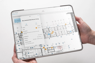 Autodesk build software is running on an iPad.